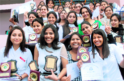 Students in jubilant mood after receiving awards during the annual prize-giving function held at Dev Samaj College, Sector 45, Chandigarh, on Friday