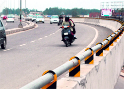 Speeding motorists find it difficult to manoeuvre their vehicles on this sharp bend on the Zirakpur flyover
