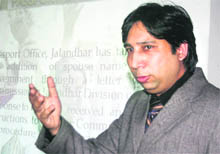 Regional Passport Officer Parneet Singh addresses a press conference in Jalandhar on Friday.