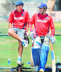 Gary Kirsten (L) and MS Dhoni will have their hands full working out the right bowling combination for the upcoming matches.