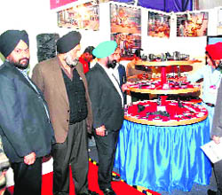 Delegates inspect a stall at the expo in Haridwar on Saturday.