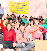 Members of the Nav Bharat Sangh protest at the Gandhi Park in Dehradun on Saturday.