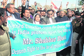 Members from the Christian community protest the killing of Pakistan minister for minorities Shahbaz Bhatti at Attari-Wagah joint checkpost on Saturday.