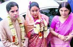 BJP leader Varun Gandhi and Yamini Roy arrive for a ritual on the eve of their wedding in Varanasi on Saturday. Varun's mother Maneka Gandhi is seen at right