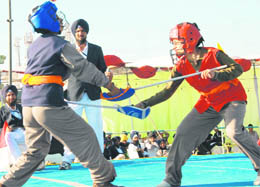 Players in action during the final day of the Punjab State Open Gatka Championship at Dasehra ground, Phase VIII, Mohali. 