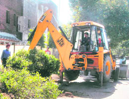 No Mercy: MC workers remove encroachments at Sector 30 in Chandigarh on Sunday.