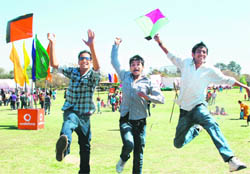 Kite Runners: Spirited youngsters enjoy kite flying.