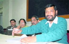 Anil Nautiyal, president of the Garhwal Mandal Vikas Nigam, addresses a press conference in Dehradun on Sunday.