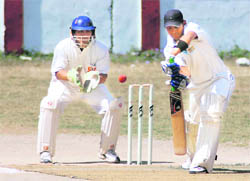 A batsman in action in a match of the 60th District Cricket League played at the Survey of India stadium in Dehradun on Sunday.