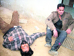 ASI Baljit Singh and constable Amandeep Singh, who were injured in Sirsa on Sunday. Photo: Amit Soni