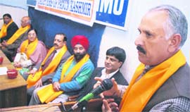 Shamsher Singh Manhas,state president of the BJP, addresses a gathering organised by the Panun Kashmir in Jammu on Sunday.