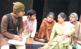 A scene from the play, Bagaana Sach, staged at Natrangs Sunday theatre in Jammu on Sunday. 