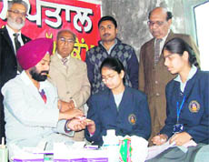 A medical camp in progress at Lehra, near Ahmedgarh, on Sunday.