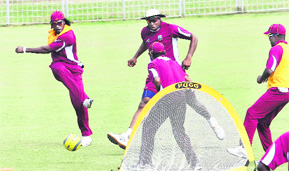 The West Indies kick off their practice session with a game of football at the Cricket Stadium, Sector 16, in Chandigarh on Monday. The players looked relaxed and performed some running exercises, followed by a stretching session. According to the team management, they will have a light training session in the gym tomorrow. Tribune photo: Pradeep Tewari