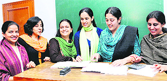 The team of teachers at the psychology department in DAV College, Sector 10, analyses a test in their lab.
