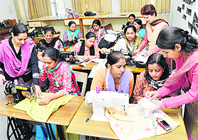 A team of fashion designing at SD College, Sector 32, takes a charity class.