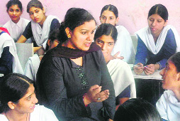 Pooja Thakur, an HIV-positive woman, speaks to school students on HIV/AIDS, reproductive health and sexual rights of women at Kaimbwala, near Chandigarh. This photo, clicked by Tribune lensman Pradeep Tewari, got the "Best of Category Award" at the annual Photoshare Awards, organised by the Johns Hopkins Bloomberg School of Public Health, Baltimore, Maryland, in 2006.