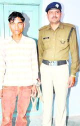 Gopi in police custody at City Kotwali in Haridwar on Monday