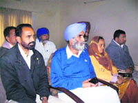 MLA HN Saini addresses mediapersons at Nalagarh on Monday.
