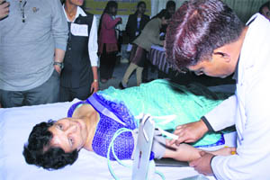 Dr Sushma Arya, principal of DAV College for Girls, donates blood at a blood donation camp in Yamunanagar.