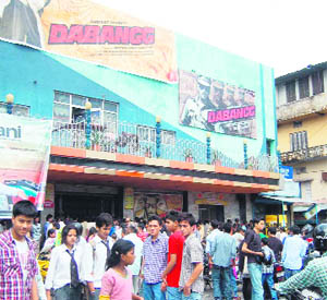The rush outside a cinema hall in Dehradun.