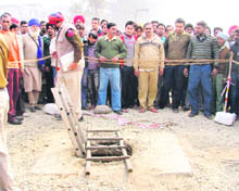 File photo of the open manhole that claimed the life of seven-year-old Sujan Gaba on January 30 this year.