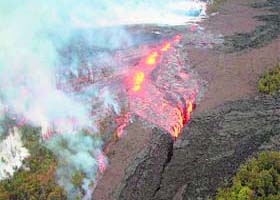Lava pours out from the Pu'u O'o vent on Kilauea volcano in Hawaii. Scientists say the Pu'u O'o crater floor has collapsed and an eruption occurred along Kilauea's eastern rift zone