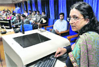 Renu Vig, director, UIET, addresses a seminar at Panjab University on Tuesday. 