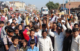 Residents block road to protest against the erratic water supply in Sarai Hussaini village in Faridabad