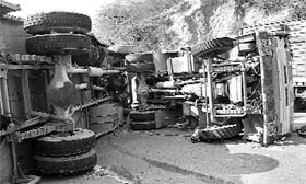 The recovery van, which was towing a Haryana roadways bus, overturned on the Ramgarh-Panchkula road on Thursday.