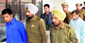 The three guilty in the Kalka gangrape case in police custody in Panchkula on Thursday.