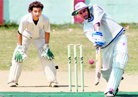 A batsman in action in the District Cricket League at the Survey of India stadium in Dehradun on Thursday. 