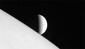 New Horizons took this image of the icy moon Europa rising above Jupiters cloud tops after the spacecrafts closest approach to Jupiter.