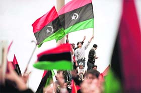 Anti-government protesters take out a march in central Benghazi