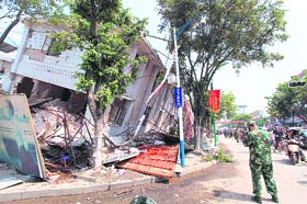Quake-hit buildings in Yingjiang county of China