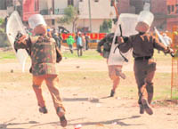 The police resorts to a lathi charge on protesting PWD employees in Sector 52, Chandigarh, on Friday