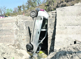 A car plunges into an under-construction culvert near the Jagti bypass in Jammu