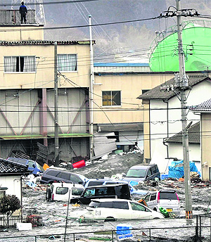 Streets are flooded after tsunami and earthquake in Kesennuma city, Miyagi Perfecture
