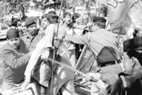 Policemen prevent protesters try to break past a barricade in Sector 28, Chandigarh