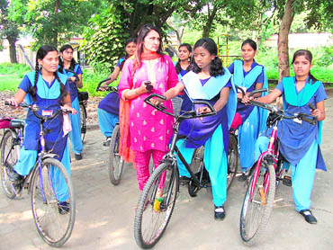 Girls of Bankipore High School with their principal Bilkis Jahan, who feels the confidence of the girls has risen as they can now move freely on their bicycles