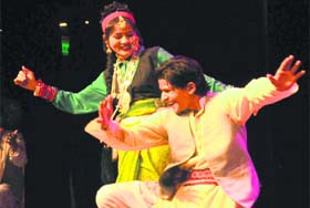 Artistes perform a cultural programme of the Garhwal community at the Tagore Theatre in Chandigarh