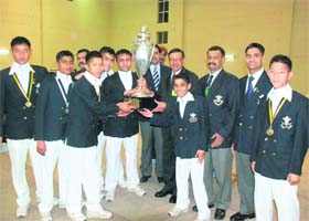 The winning team with the trophy of the RIMC inter-section boxing competition in Dehradun