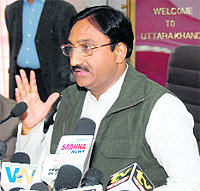 Chief Minister Ramesh Pokhriyal Nishank addresses a press conference in Dehradun on Sunday.