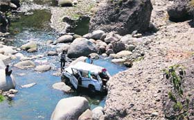The mangled remains of a Sumo that fell into a gorge at Sakoh near Dharamsala