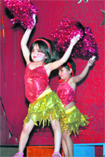 Kids present a dance performance during the annual function of Mothers Touch Kindergarten School in Ludhiana.