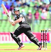 New Zealands Ross Taylor plays a shot during their match against Canada in Mumbai on Sunday. New Zealand won by 97 runs.
