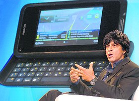 Bollywood actor and Nokia India Brand Ambassador Shah Rukh Khan interacts with the media during the launch of new Nokia E7 handset. The All-in-One Business Smart Phone is priced at Rs 29,999.