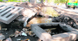 Water accumulated on the road opposite MCMDAV College due to road widening at Sector 36 in Chandigarh.