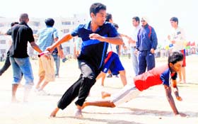 Students take part in a relay race on the concluding day of a three-day sports meet at the Punjab College of Engineering and Technology in Lalru on Monday. 