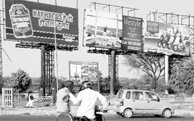 Advertisement hoardings put up near the Sector 4-5-10-11 roundabout in Panchkula. From April 1, the MC has allowed display of advertisements on 318 electricity poles across the town to generate more revenue.